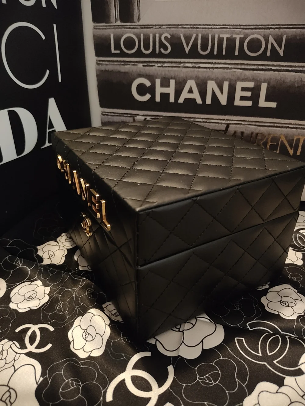 Black Quilted Jewelry Case with Gold Logo Accents And Mirror